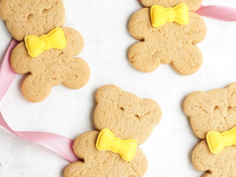 Overhead image of teddy bear biscuits wearing bow ties