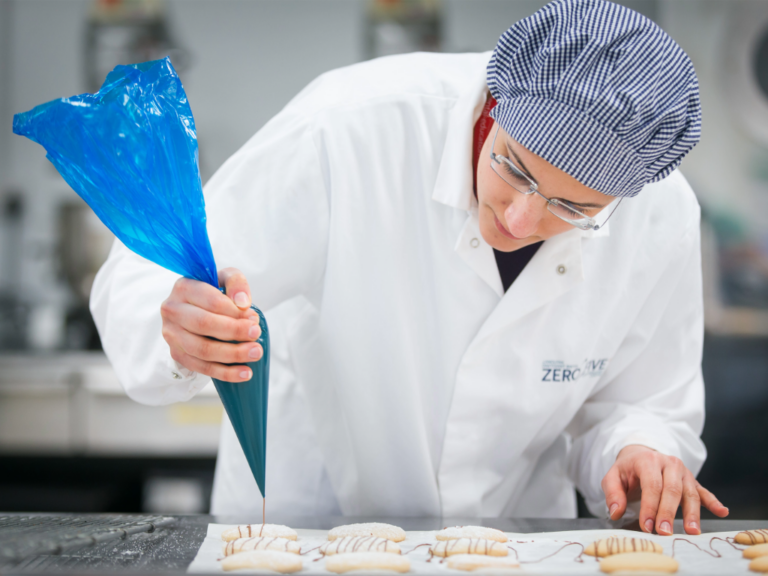 Baker piping chocolate