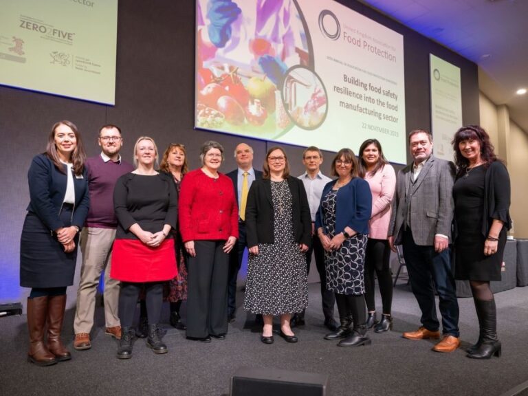 UKAFP speakers and officers on stage at the conference