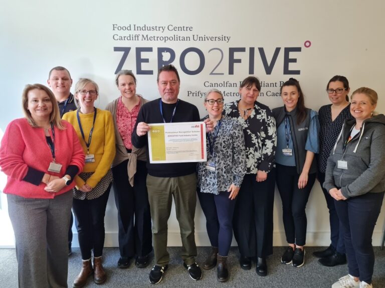 Members of the ZERO2FIVE team posing with the IFST group membership certificate