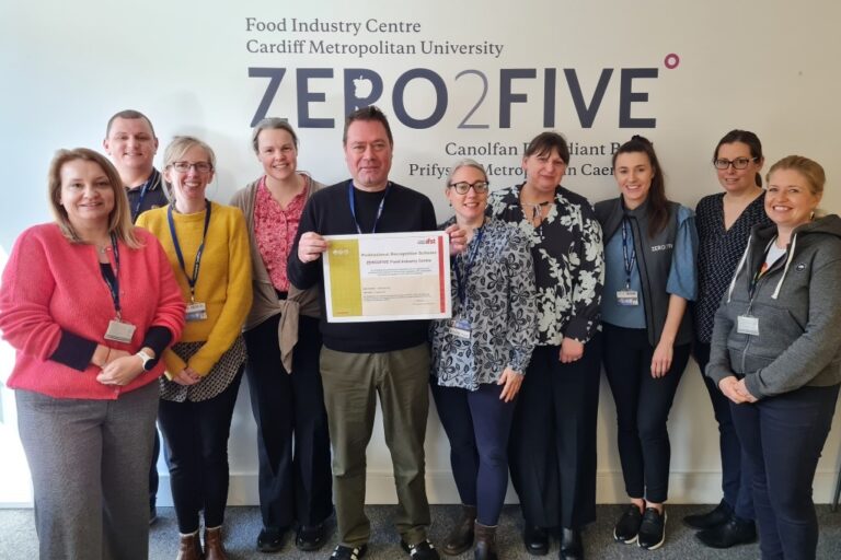 Members of the ZERO2FIVE team posing with the IFST group membership certificate