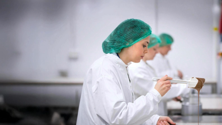 Food technologist using spatula