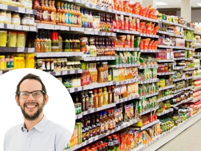Ed Gilbert superimposed over a supermarket aisle
