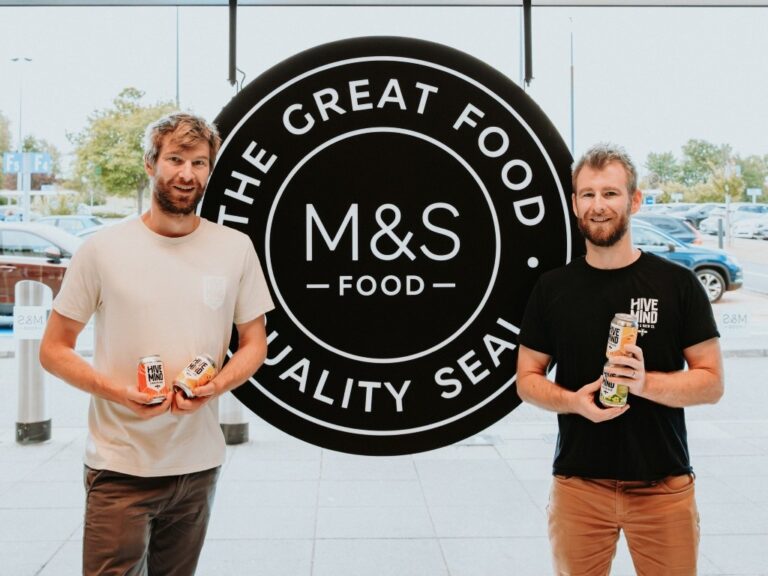 Kit and Matt Newell, owners of Hive Mind, standing in Marks and Spencer