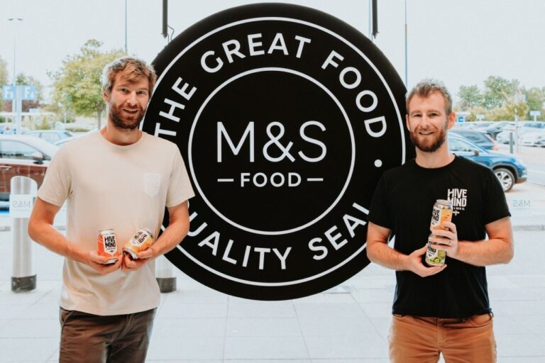 Kit and Matt Newell, owners of Hive Mind, standing in Marks and Spencer