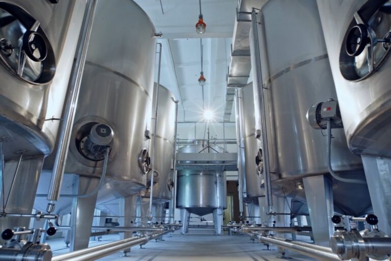 Interior of a factory showing steel vessels